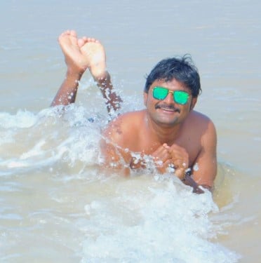 Santhosh Kumar enjoying swimming